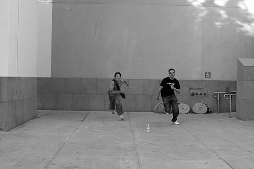 Batman and Robin, aka Jimmy and Franco, running towards the camera, picture 2. Batman and Robin, aka Jimmy and Franco, running towards the camera, picture 2.