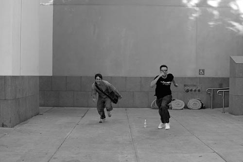 Batman and Robin, aka Jimmy and Franco, running towards the camera, picture 3. Batman and Robin, aka Jimmy and Franco, running towards the camera, picture 3.