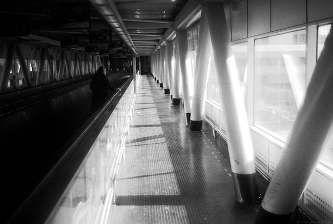 007 Woman On Moving Walkway